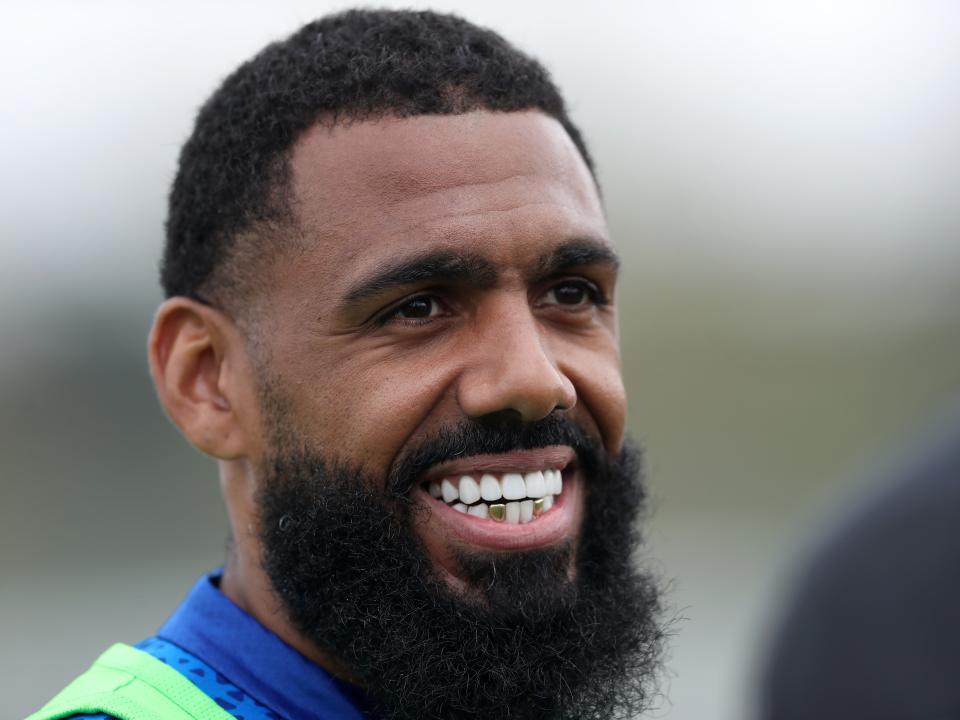 Yann M'Vila smiling during a training session