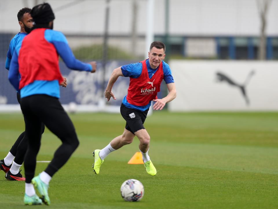 Jed Wallace chasing the ball during training 