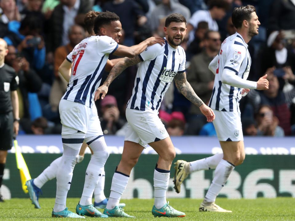 Alex Mowatt celebrates scoring a penalty against Preston with team-mates