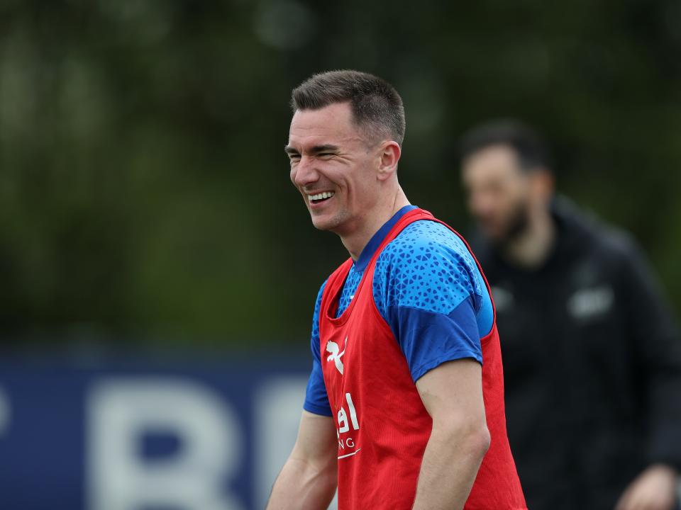 Jed Wallace smiling during a training session