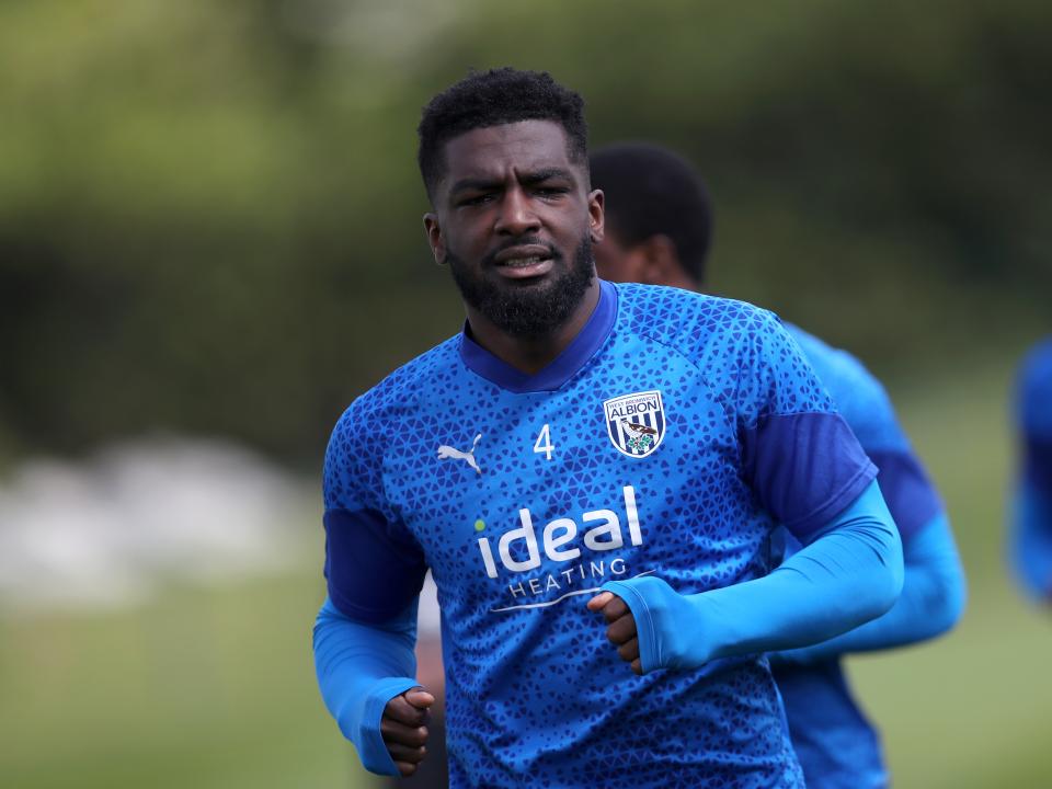 Cedric Kipre warming up before training 