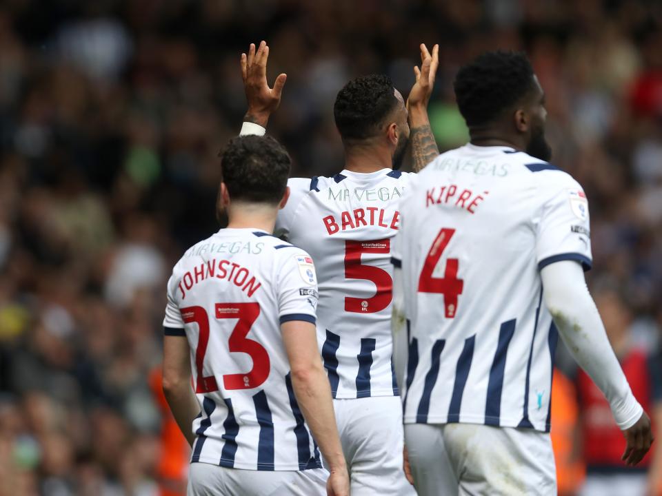 Kyle Bartley celebrates scoring against Preston with team-mates