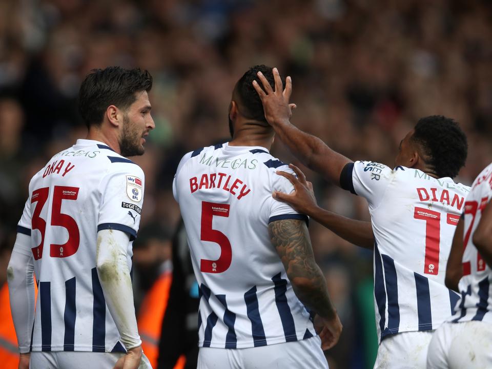 Kyle Bartley celebrates scoring against Preston with team-mates