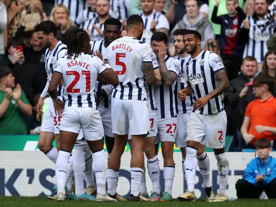 Darnell Furlong celebrates scoring against Preston with team-mates