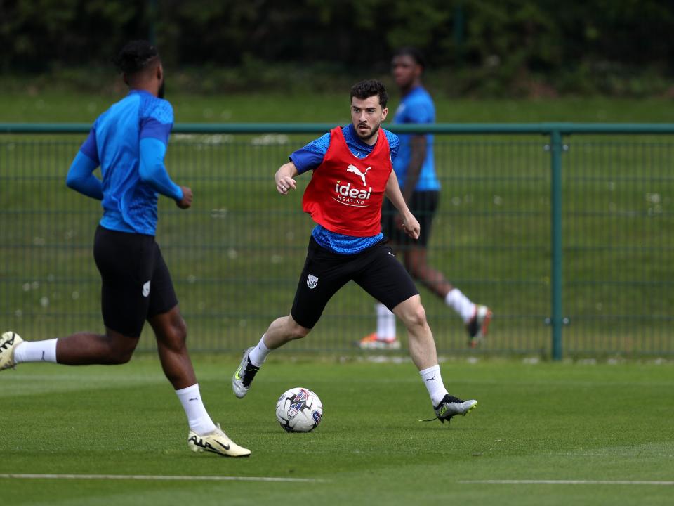 Mikey Johnston on the ball during training 