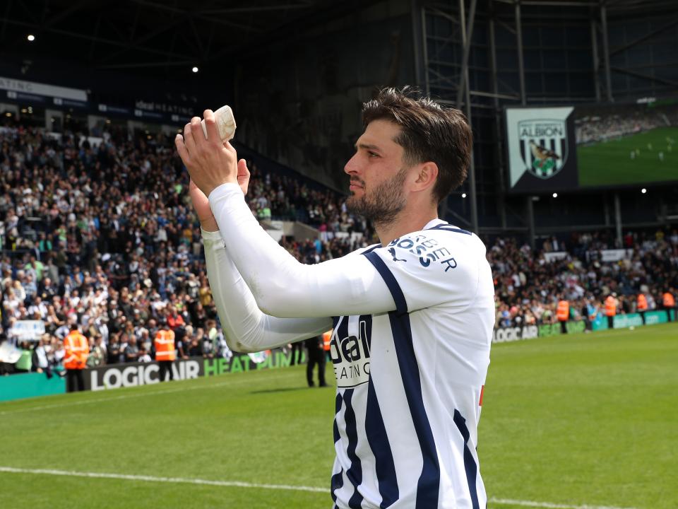 Okay Yokuslu celebrates the win against Preston at full-time 