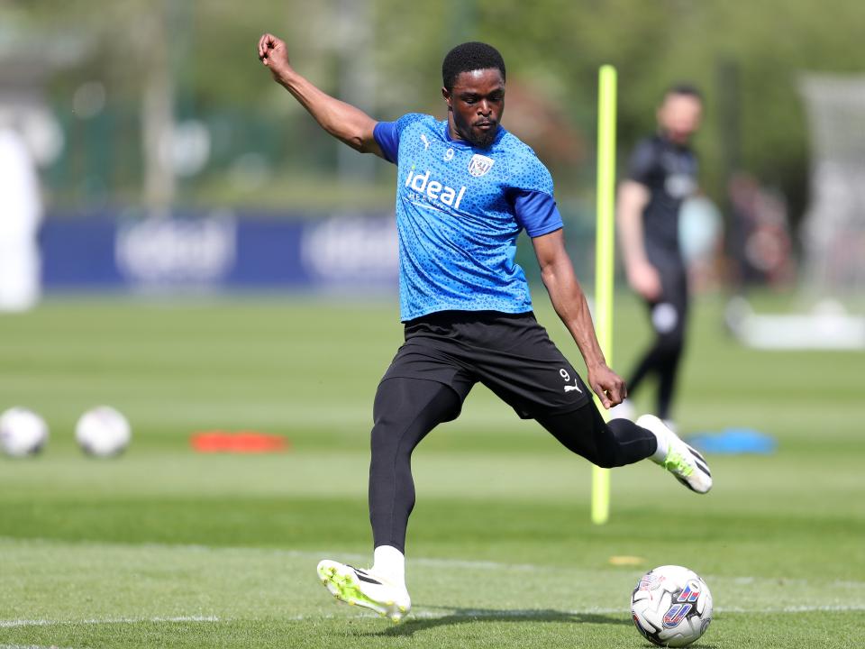 Josh Maja striking the ball during training 