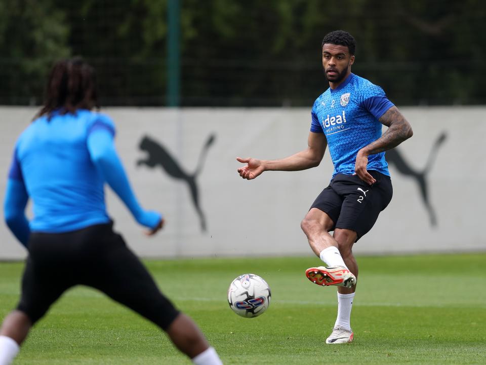 Darnell Furlong making a pass during a training session