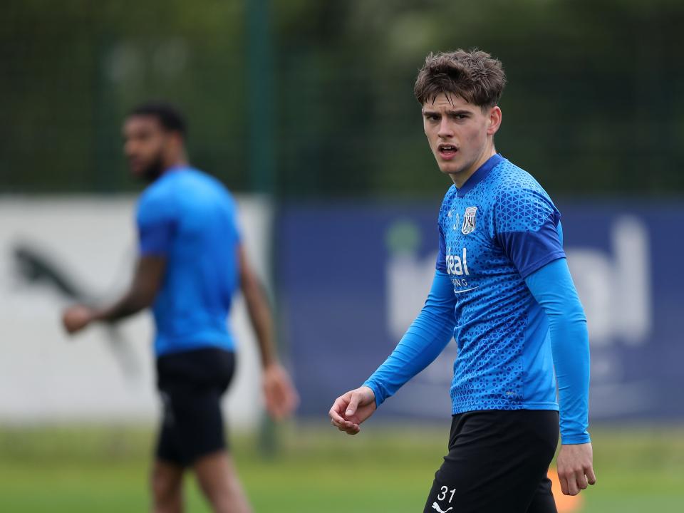 Tom Fellows watching on during a training session 