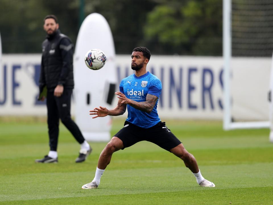 Darnell Furlong watching the ball during a training session 