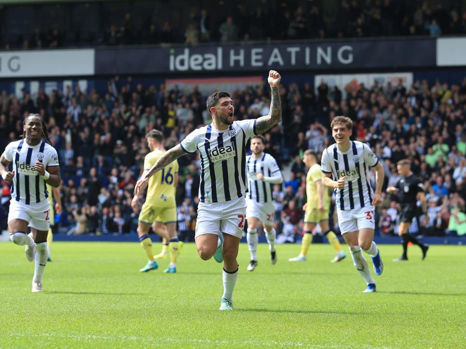 Alex Mowatt celebrates scoring a penalty against Preston