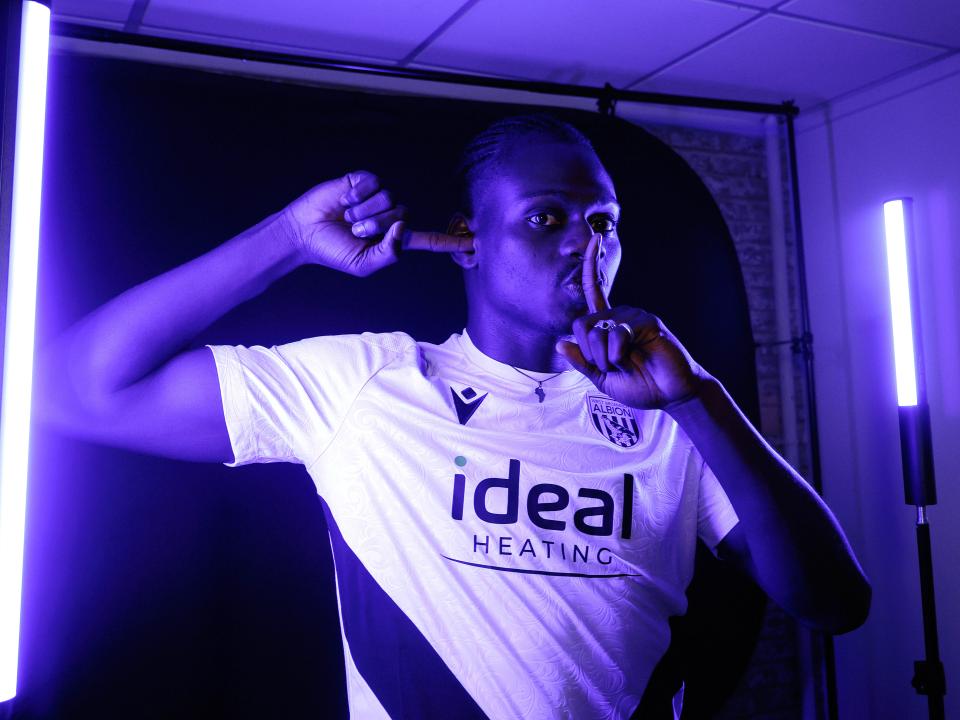 Ousmane Diakité posing for the camera inside a TV studio 