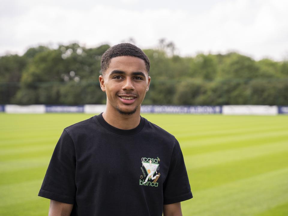 A photo of Albion youngster Deago Nelson with the club's training ground in the buckshot 
