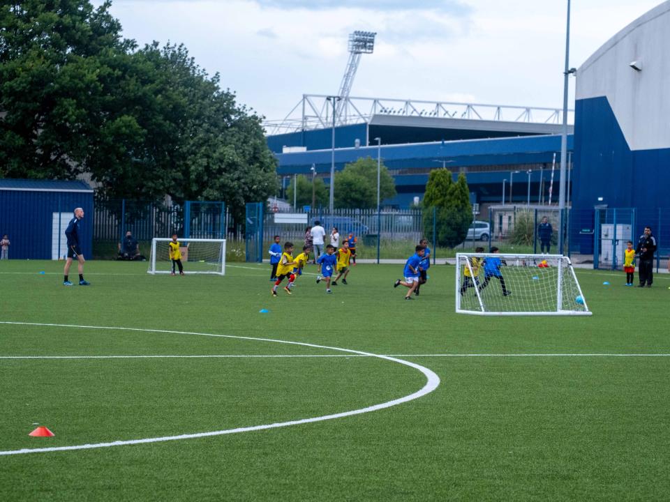 Players enjoy their match at the South Asian Emerging Talent Festival with the backdrop of The Hawthorns.