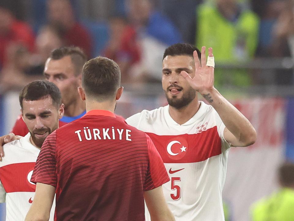 Okay Yokuslu celebrates with his Turkiye team-mates following their victory over Czechia at UEFA EURO 2024