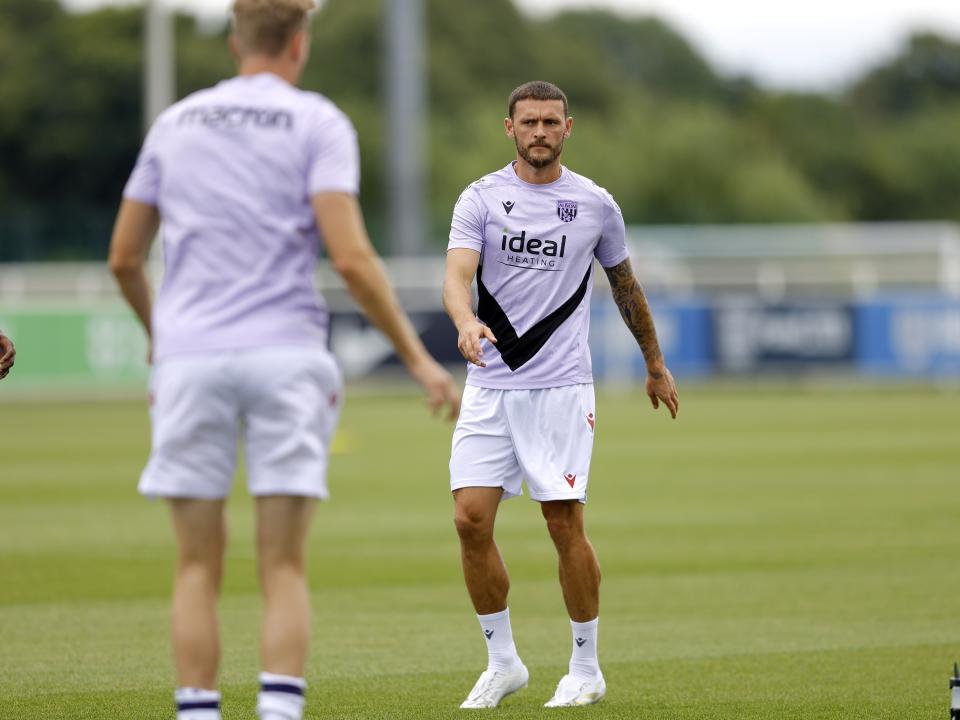 An image of John Swift warming up for Albion's friendly against Peterborough