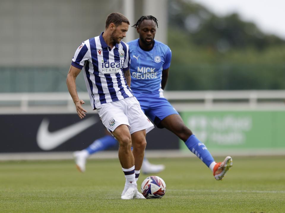 An image of John Swift on the ball during Albion's friendly against Peterborough