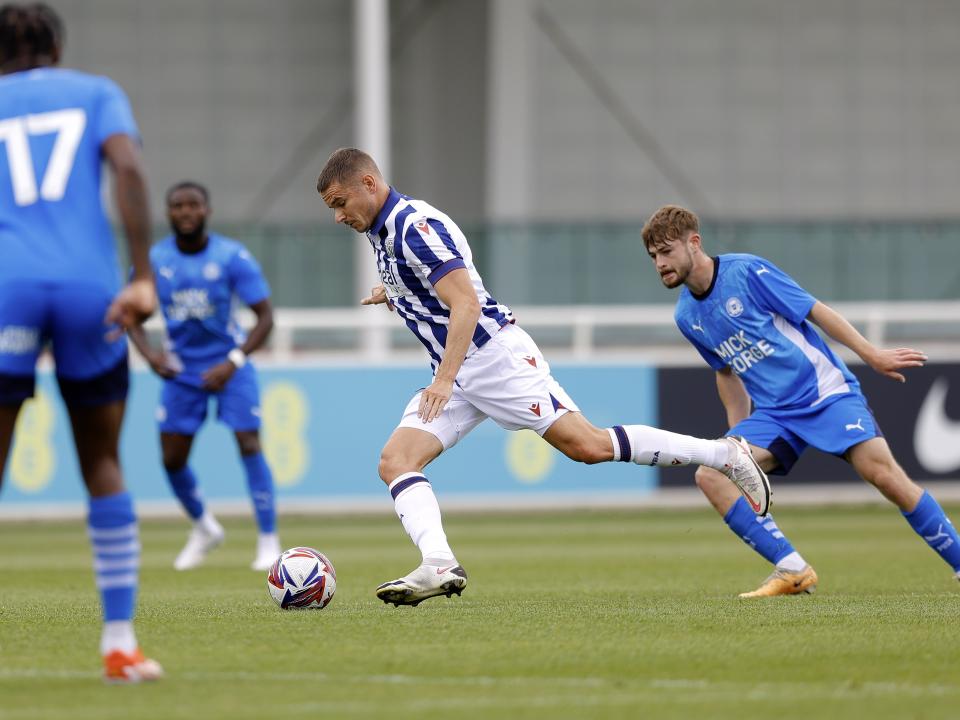 An image of Conor Townsend on the ball during Albion's friendly against Peterborough