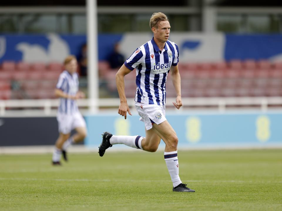 An image of Torbjorn Heggem running during Albion's friendly against Peterborough