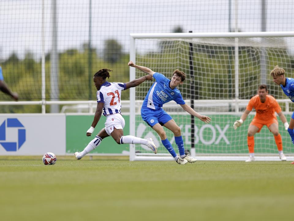 An image of Brandon Thomas-Asante shooting during Albion's friendly against Peterborough