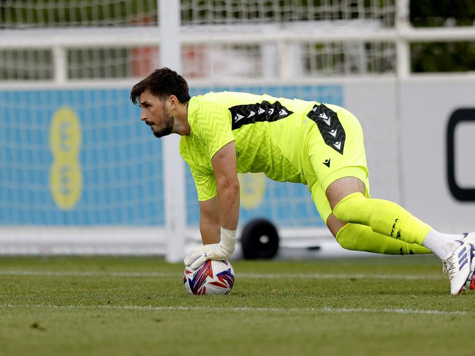 An image of Joe Wildsmith on the ball during Albion's friendly against Peterborough