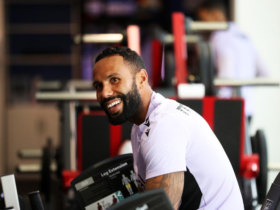 Kyle Bartley smiling in the gym at St. George's Park
