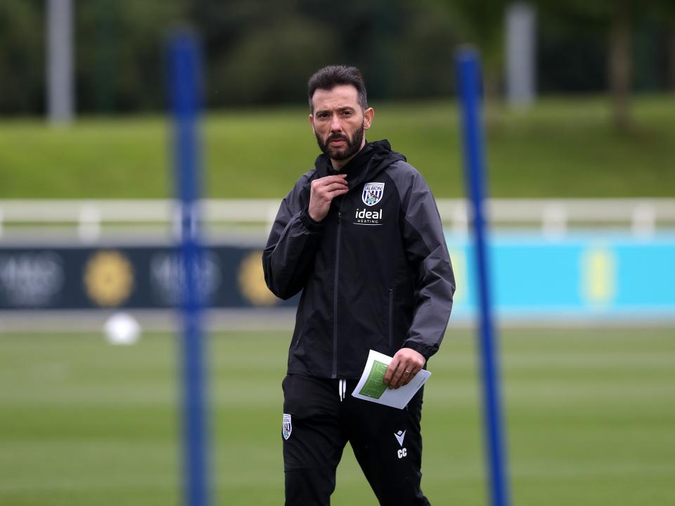 Carlos Corberán out on the training pitch at St. George's Park