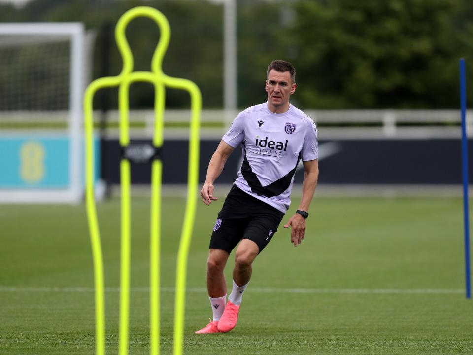 Jed Wallace stood by a mannequin during a training session at St. George's Park