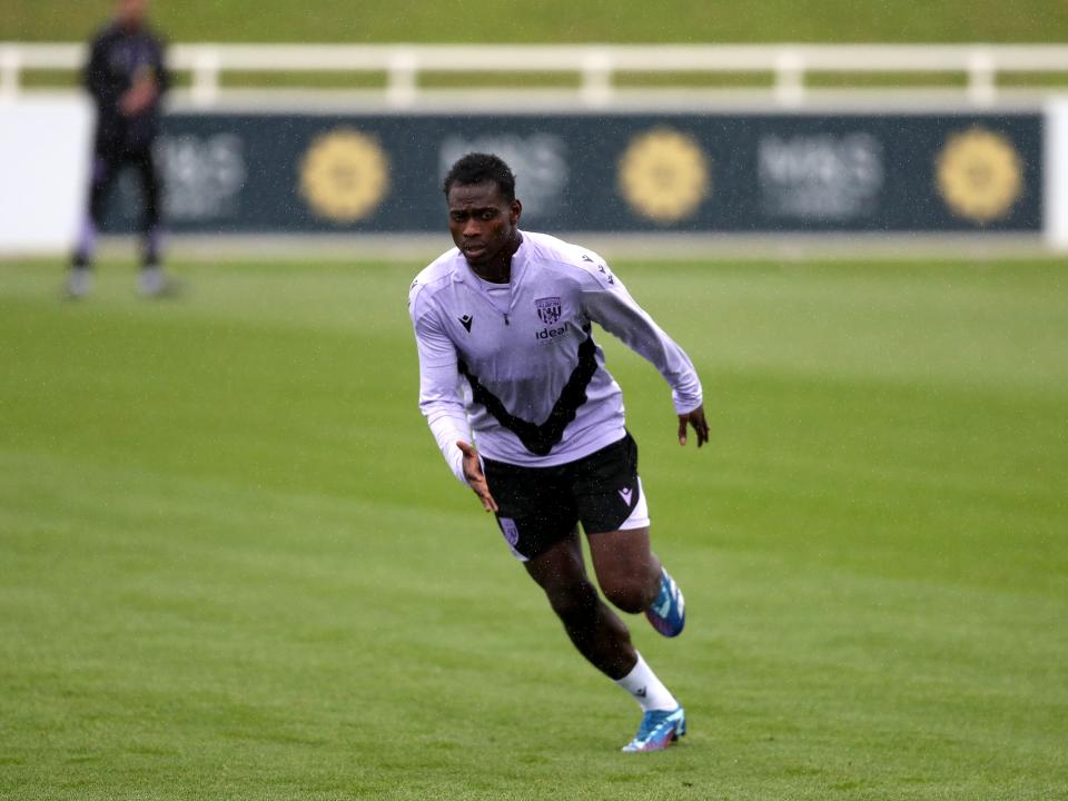 Ousmane Diakité running forwards during a training session at St. George's Park