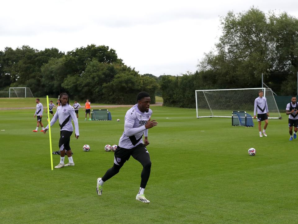 Josh Maja running forwards during a training session 