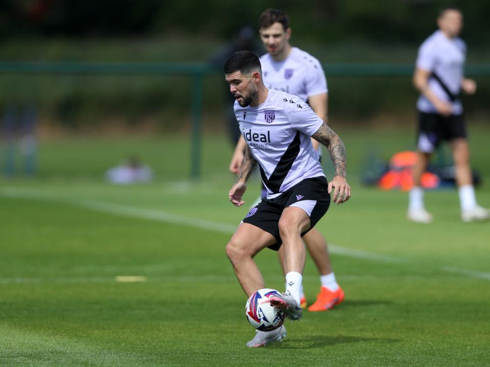 Alex Mowatt on the ball during training 