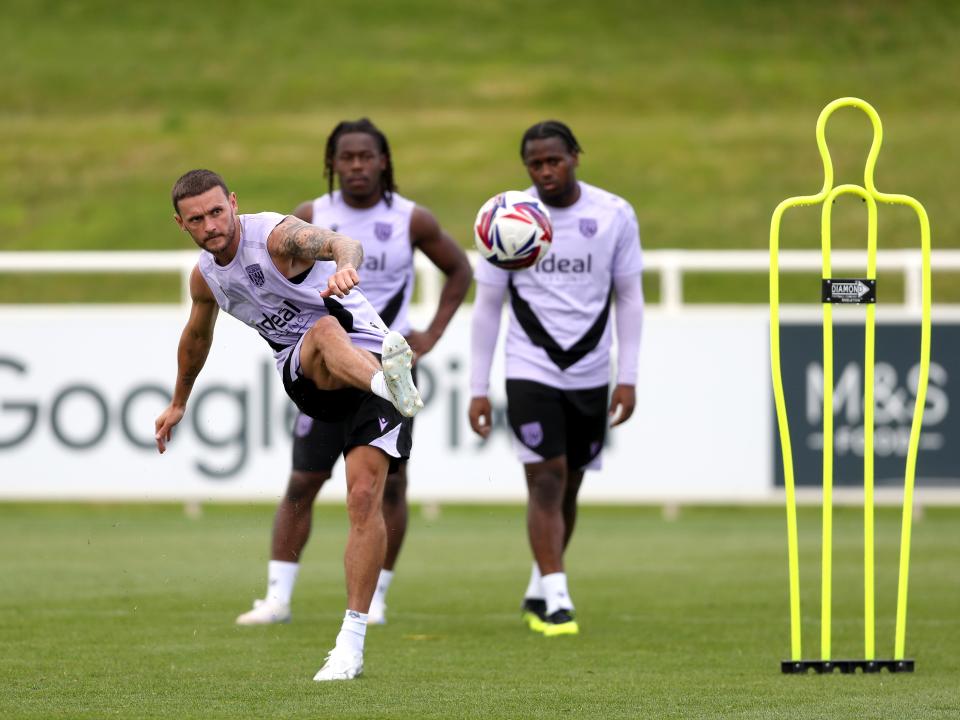 John Swift takes a shot during a training session at St. George's Park