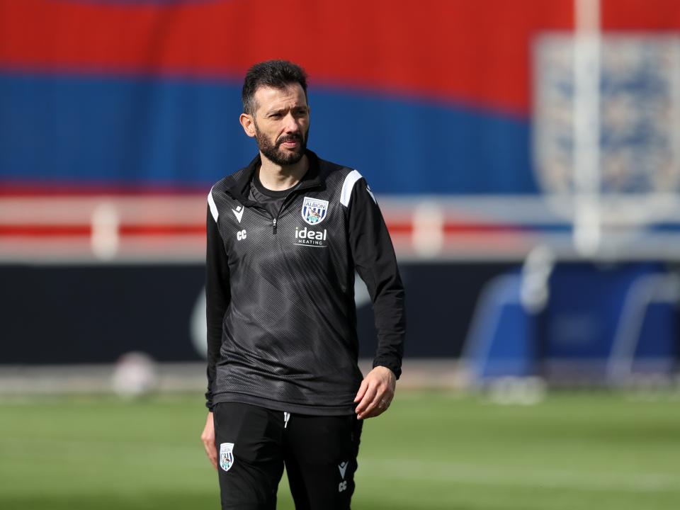 Carlos Corberán out on the training pitch at St. George's Park
