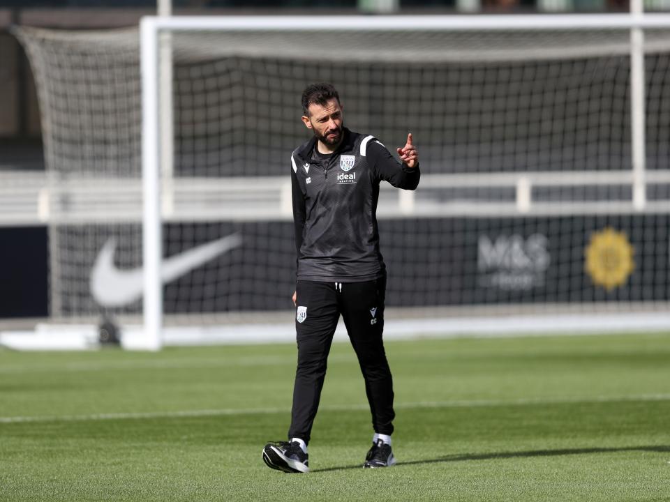 Carlos Corberán out on the training pitch at St. George's Park