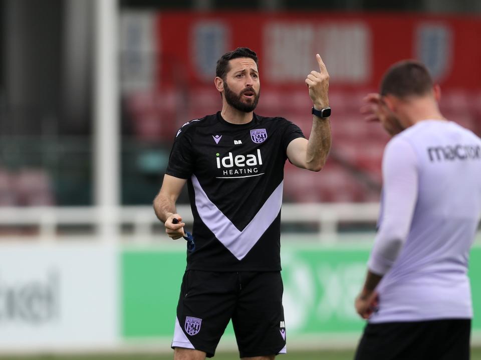 Coach Damia Abella out on the training pitch at St. George's Park