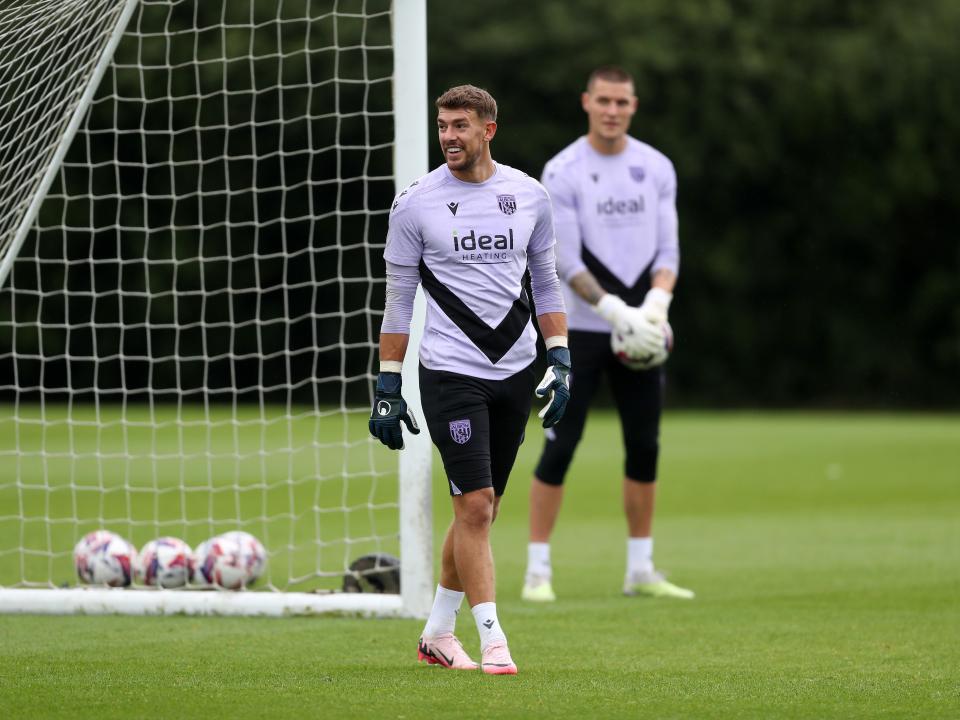 Alex Palmer smiling during a training session
