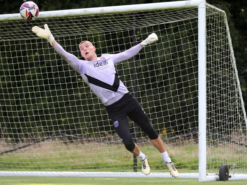 Ted Cann saving a shot during a training session at St. George's Park