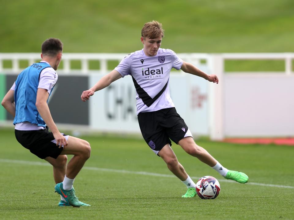 Ollie Bostock on the ball during a training session at St. George's Park