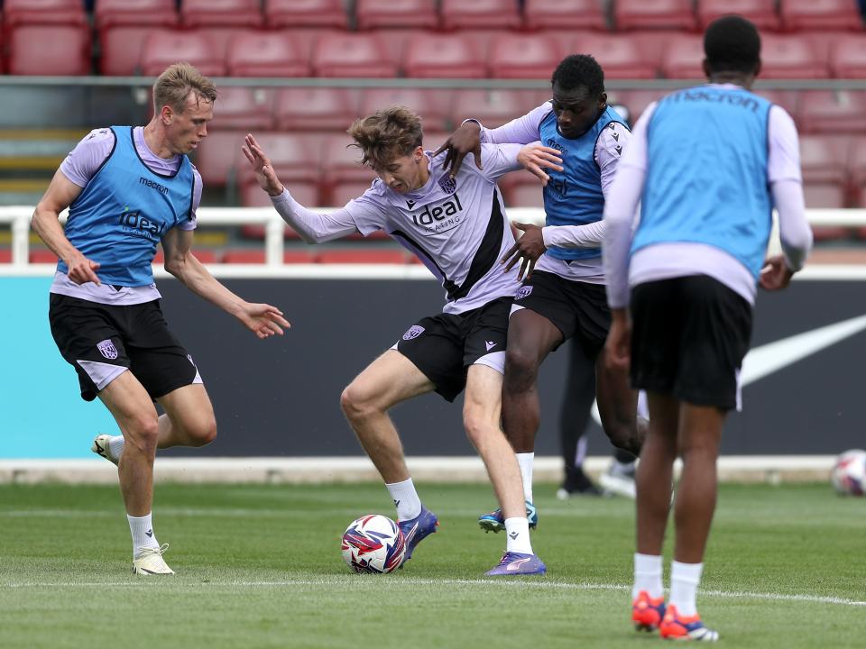 Harry Whitwell, Torbjørn Heggem and Ousmane Diakité battle for the ball during training at St. George's Park 