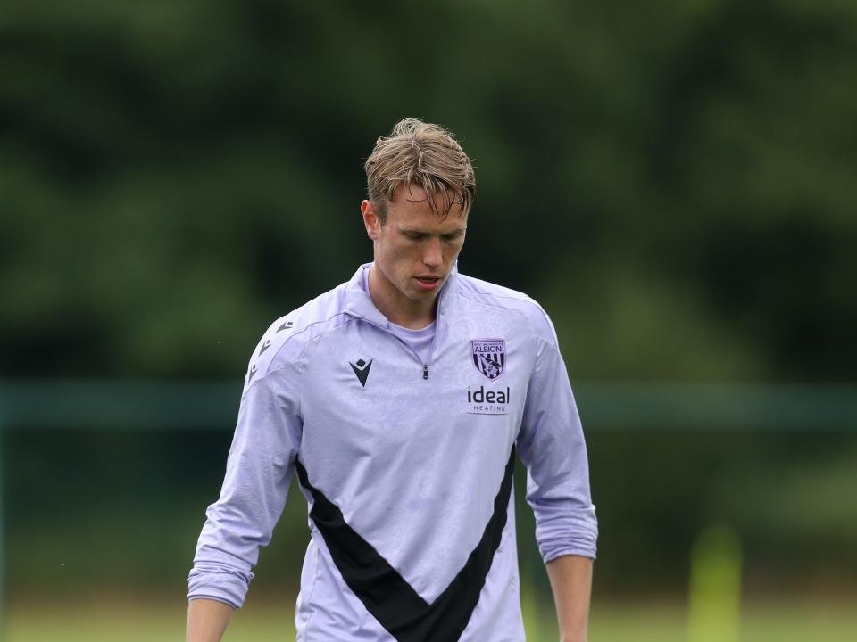 Torbjørn Heggem looking down at the pitch during a training session 