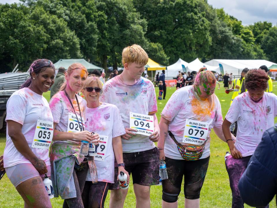 Group of running gathering for a photo