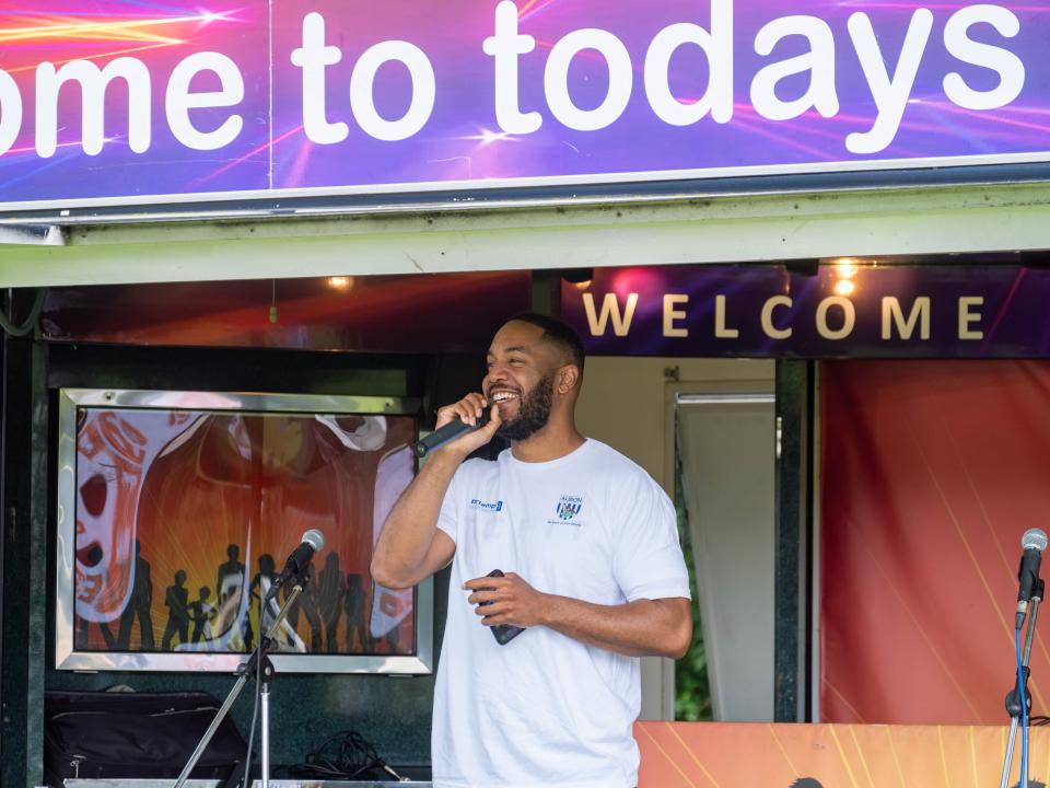 Tony Clarke (TC Fit) speaking on the mic.