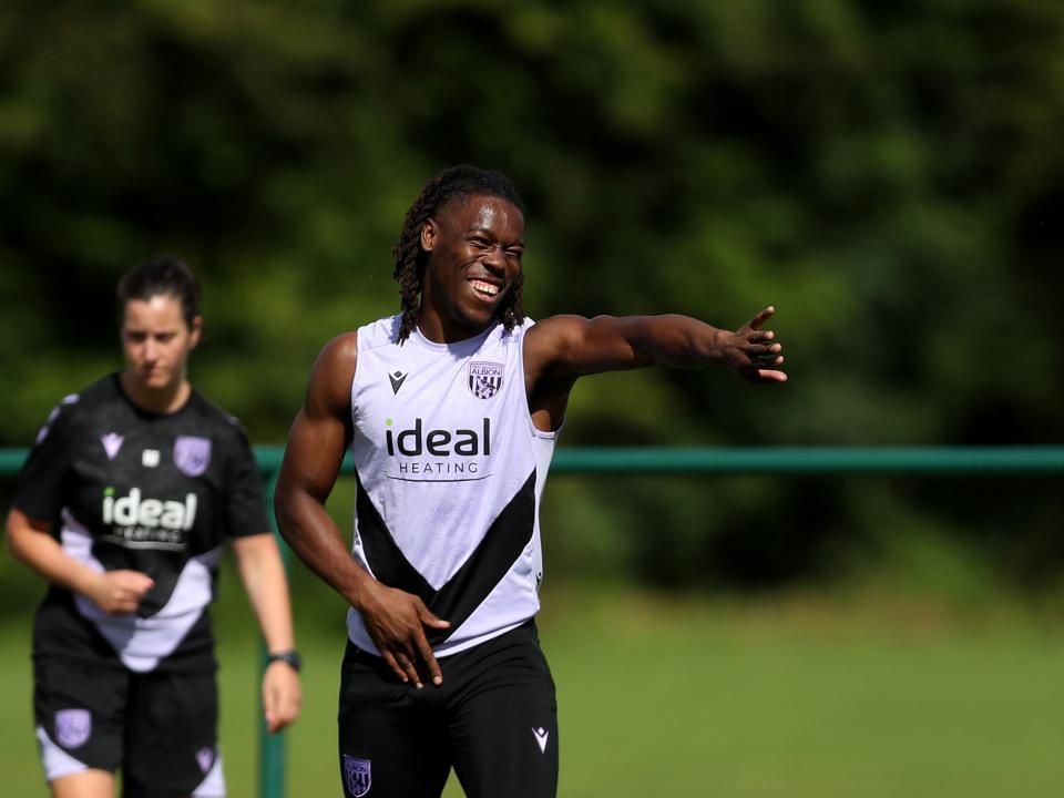 Brandon Thomas-Asante smiling during training 