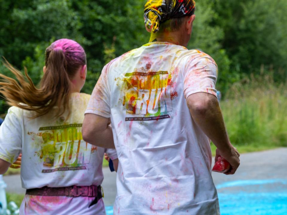 Back of Blind Dave Heeley and Dannie Heeley running the course. 