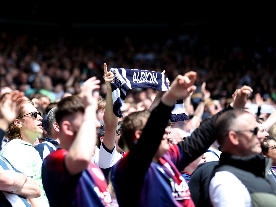 An Albion scarf being shown among The Hawthorns crowd