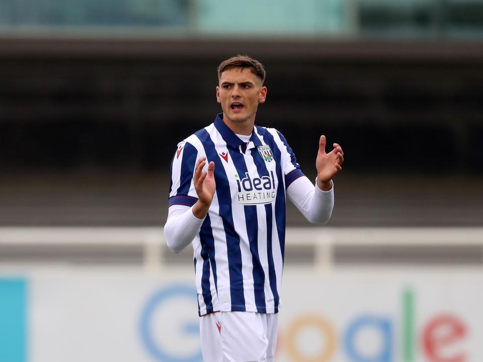 Caleb Taylor in action for Albion in a pre-season friendly wearing the home kit 