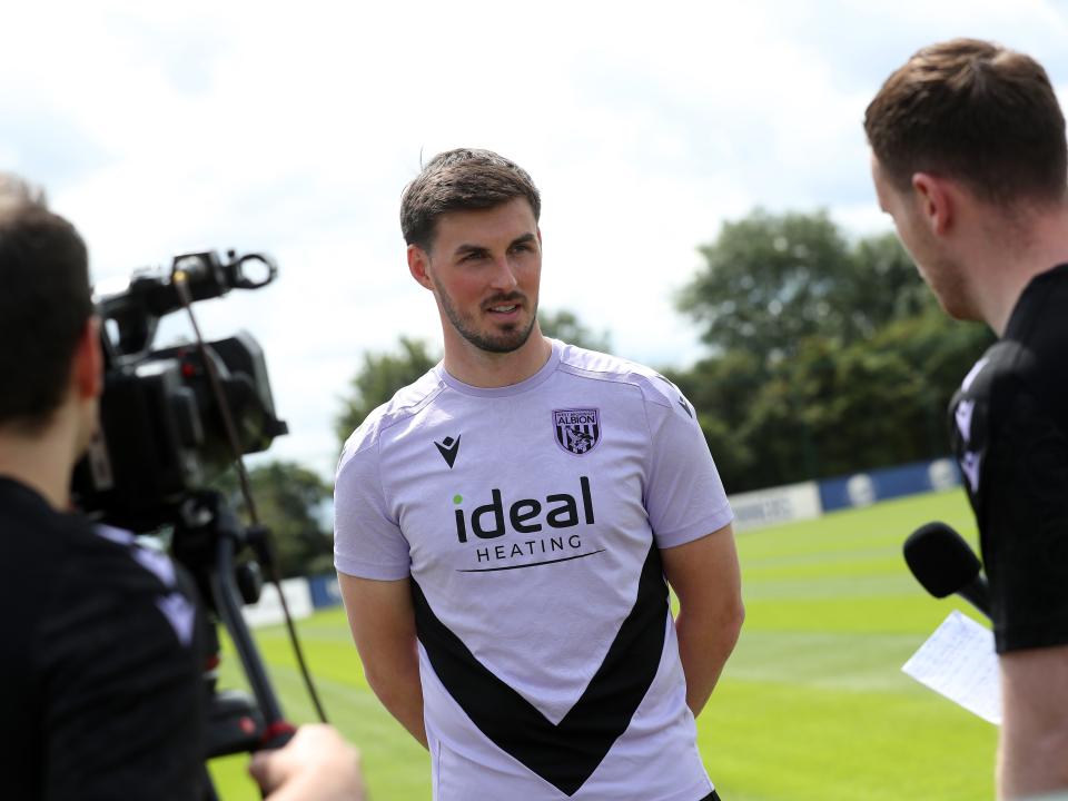 A photo of Albion goalkeeper Joe Wildsmith talking to WBA TV at the club's training ground