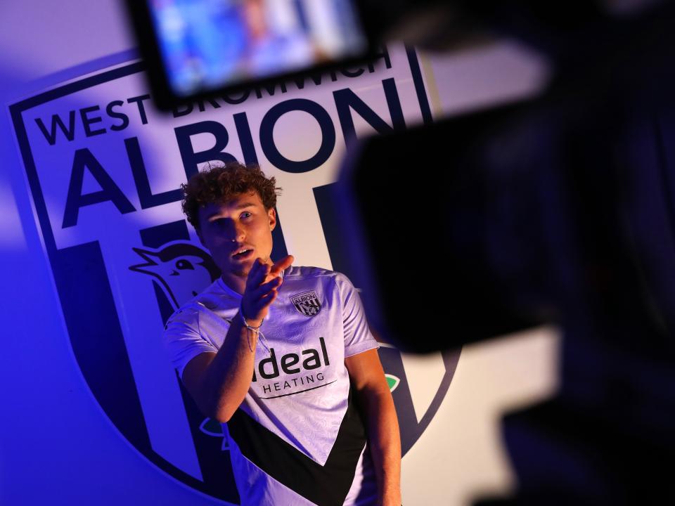 Callum Styles being interviewed in front of a WBA badge 