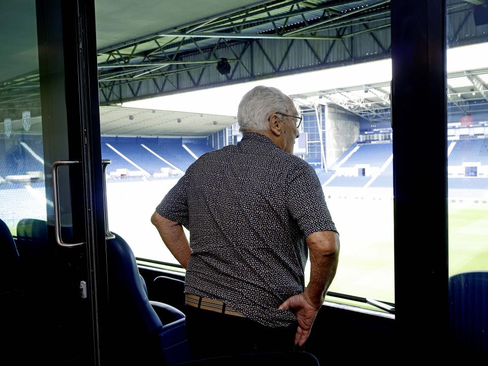 Graham Williams looking out on to the pitch from the Graham Williams Suite at The Hawthorns 