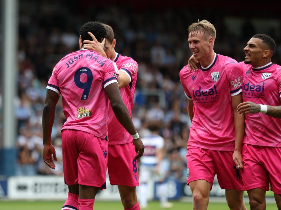 Josh Maja celebrates scoring his first goal at QPR with team-mates 